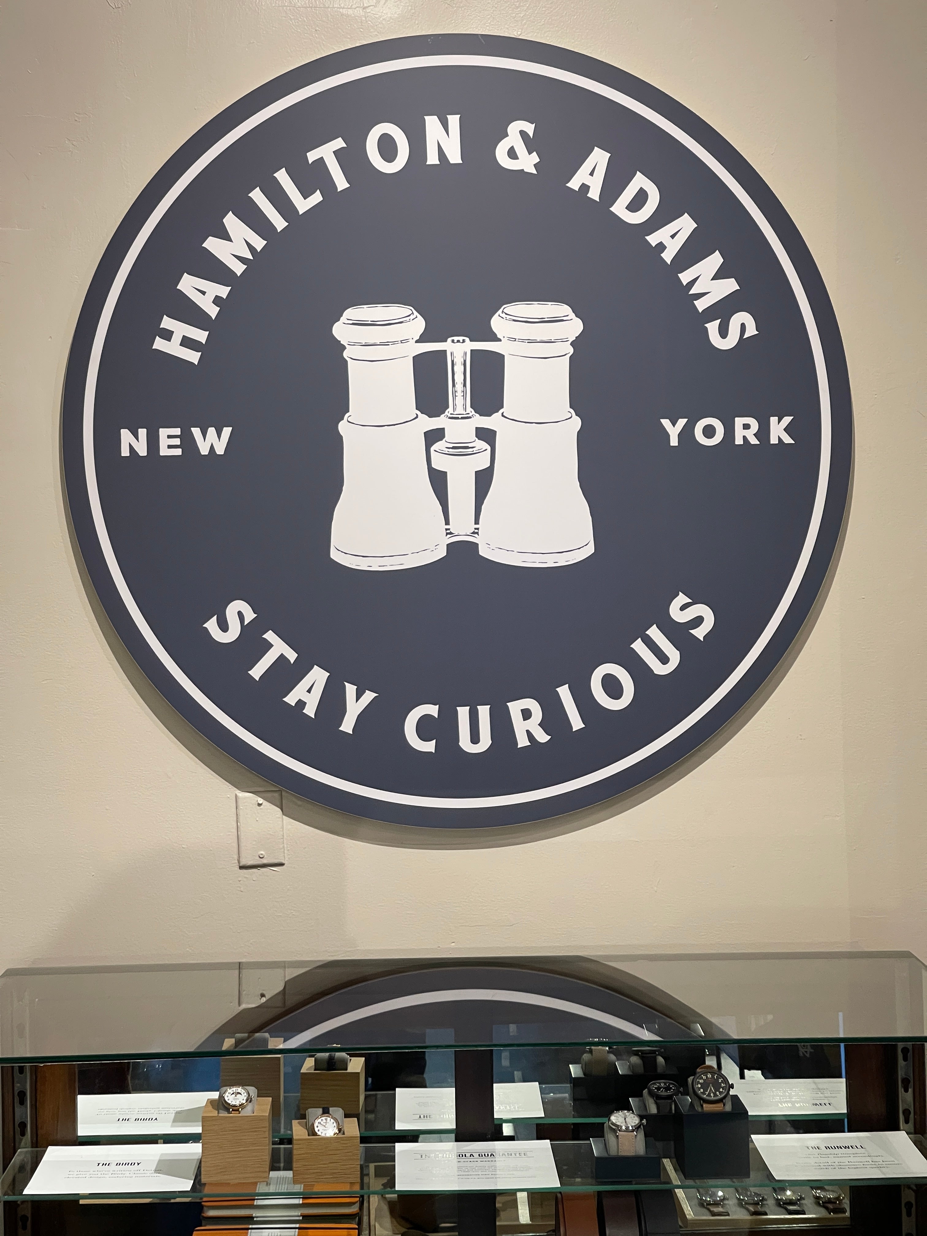Hamilton and Adams logo with binoculars 